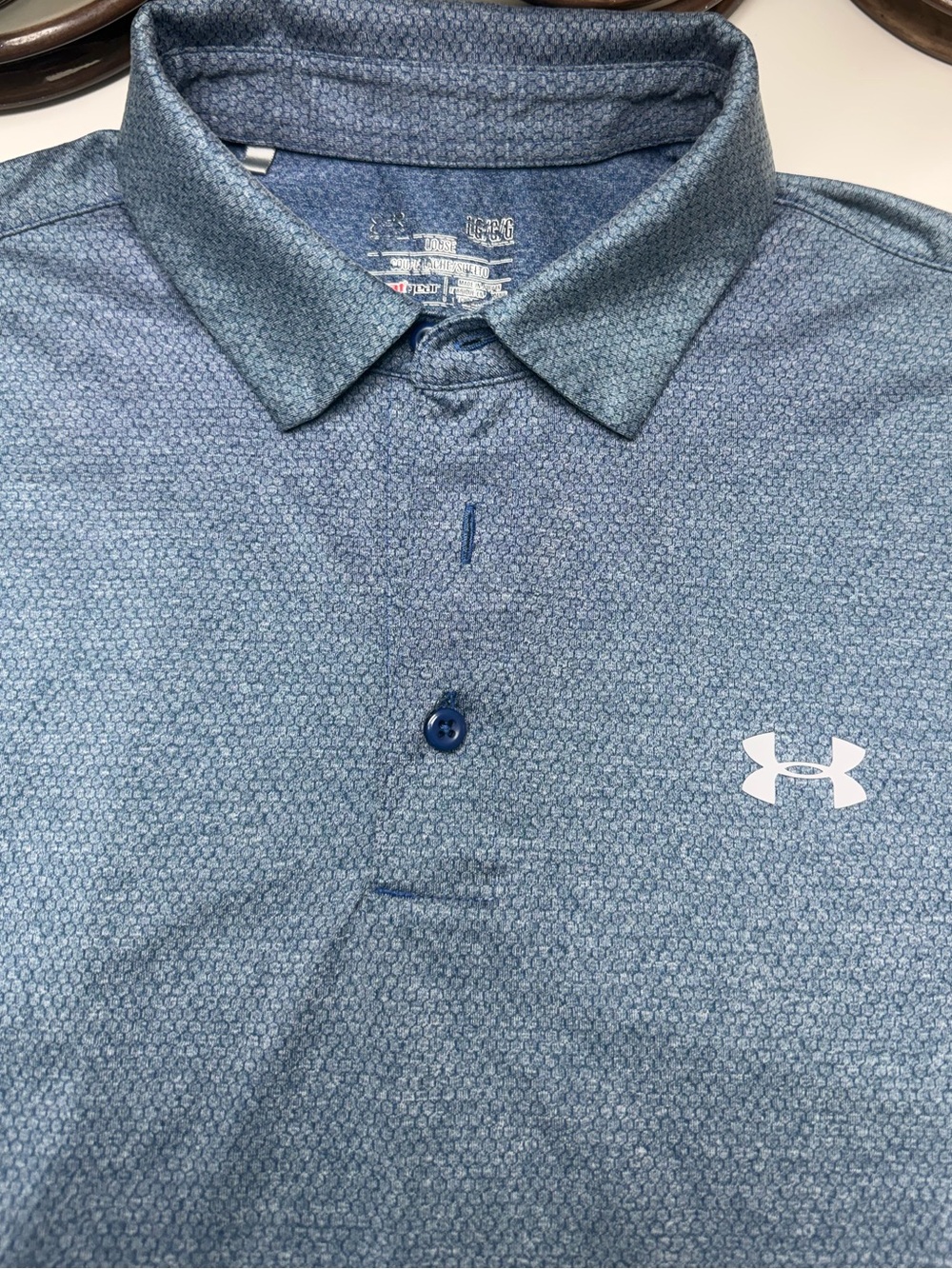 UA L Short Sleeve Tee w Collar. Blue with Geometric Pattern